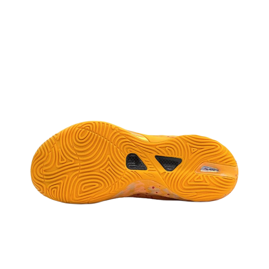 Unisex low-top basketball sneaker outsole in orange-yellow with traction tread pattern