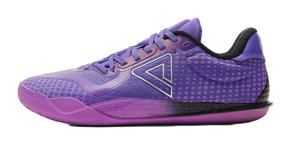 Unisex basketball shoe in crystal purple with black sole edge and lace-up front