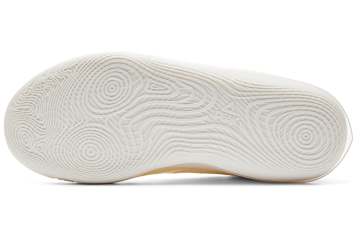 Milky white basketball shoe outsole with patterned tread