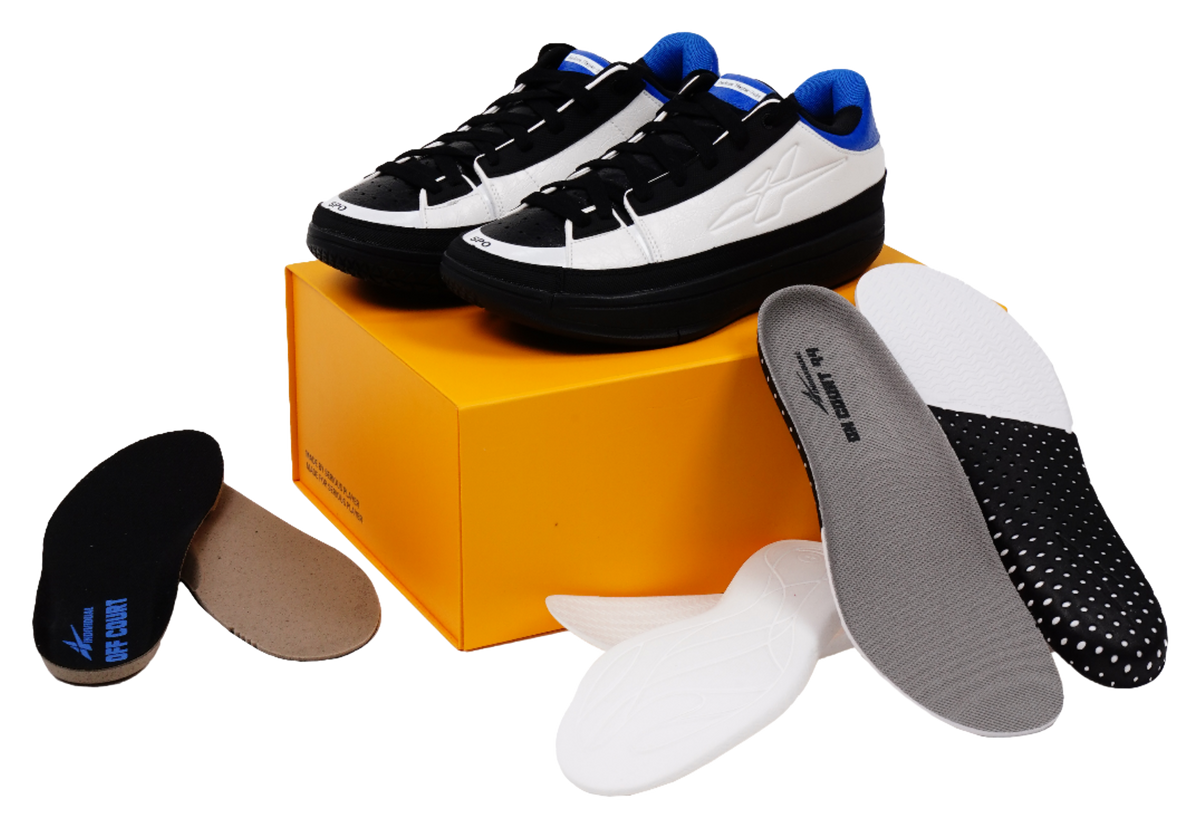 Unisex basketball shoes with included gray-and-black insoles/liners shown beside them.