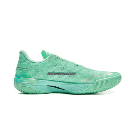 Basketball shoe side view with mint-green mesh upper and graphic midsole design.