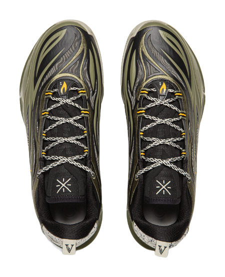 Pair of basketball shoes showing black laces and olive-green toe panels