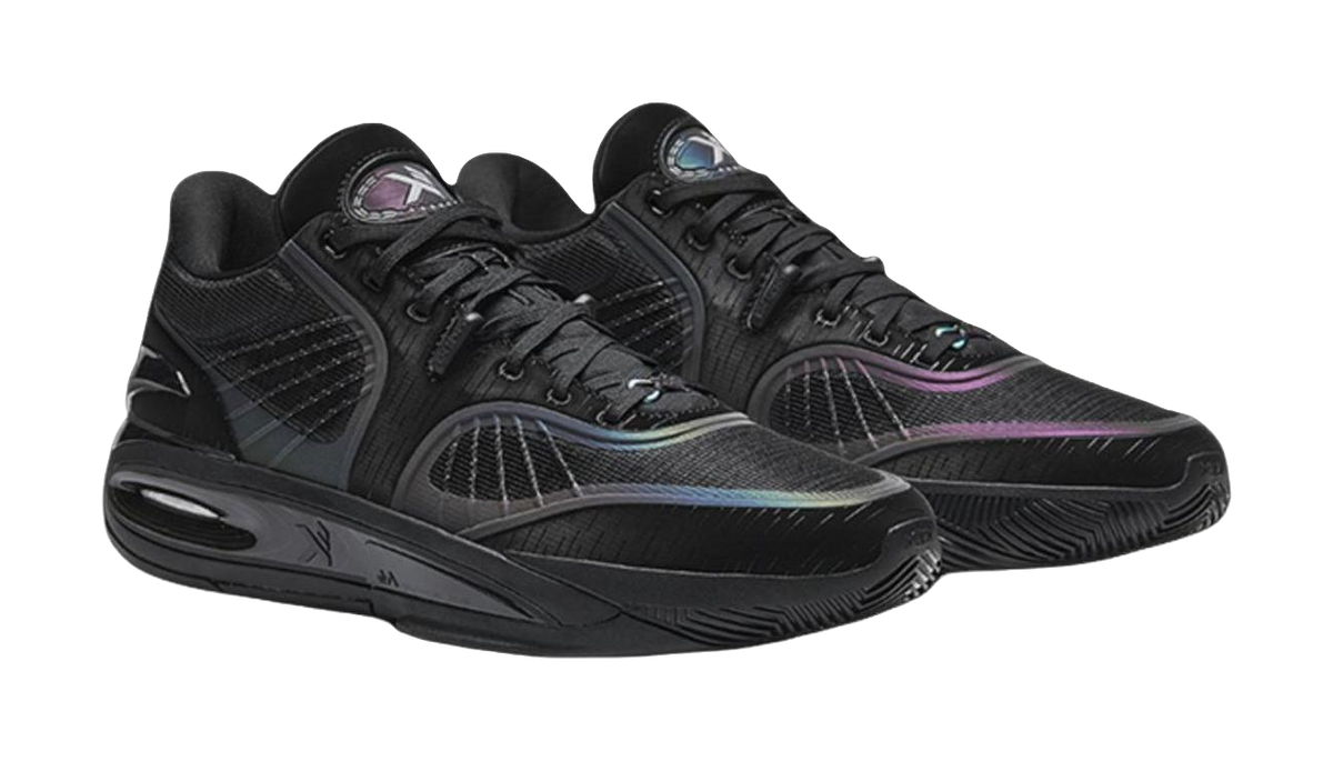 Black basketball shoes with lace-up uppers, purple trim details, and heel air-cushion unit