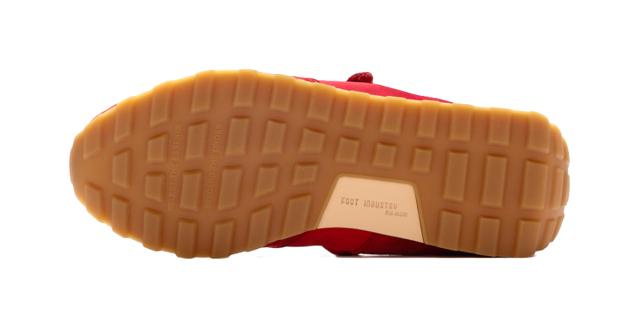 Red Mary Jane shoes outsole with tread pattern and tan rubber base