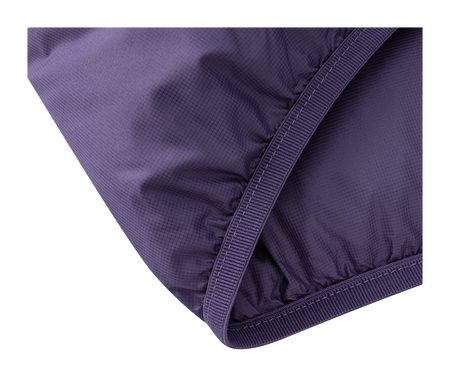 Purple puffer jacket sleeve cuff close-up with elastic seam and quilted panels