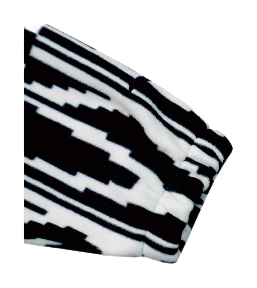 Folded sweatshirt jacket sleeve with bold black-and-white all-over graphic pattern.