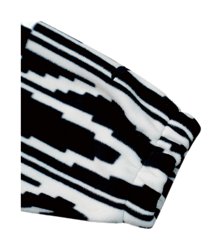 Folded sweatshirt jacket sleeve with bold black-and-white all-over graphic pattern.