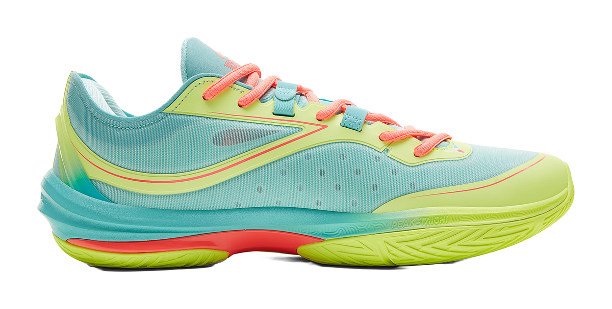 Lightweight basketball shoe side profile, ice blue upper with coral laces and neon green sole