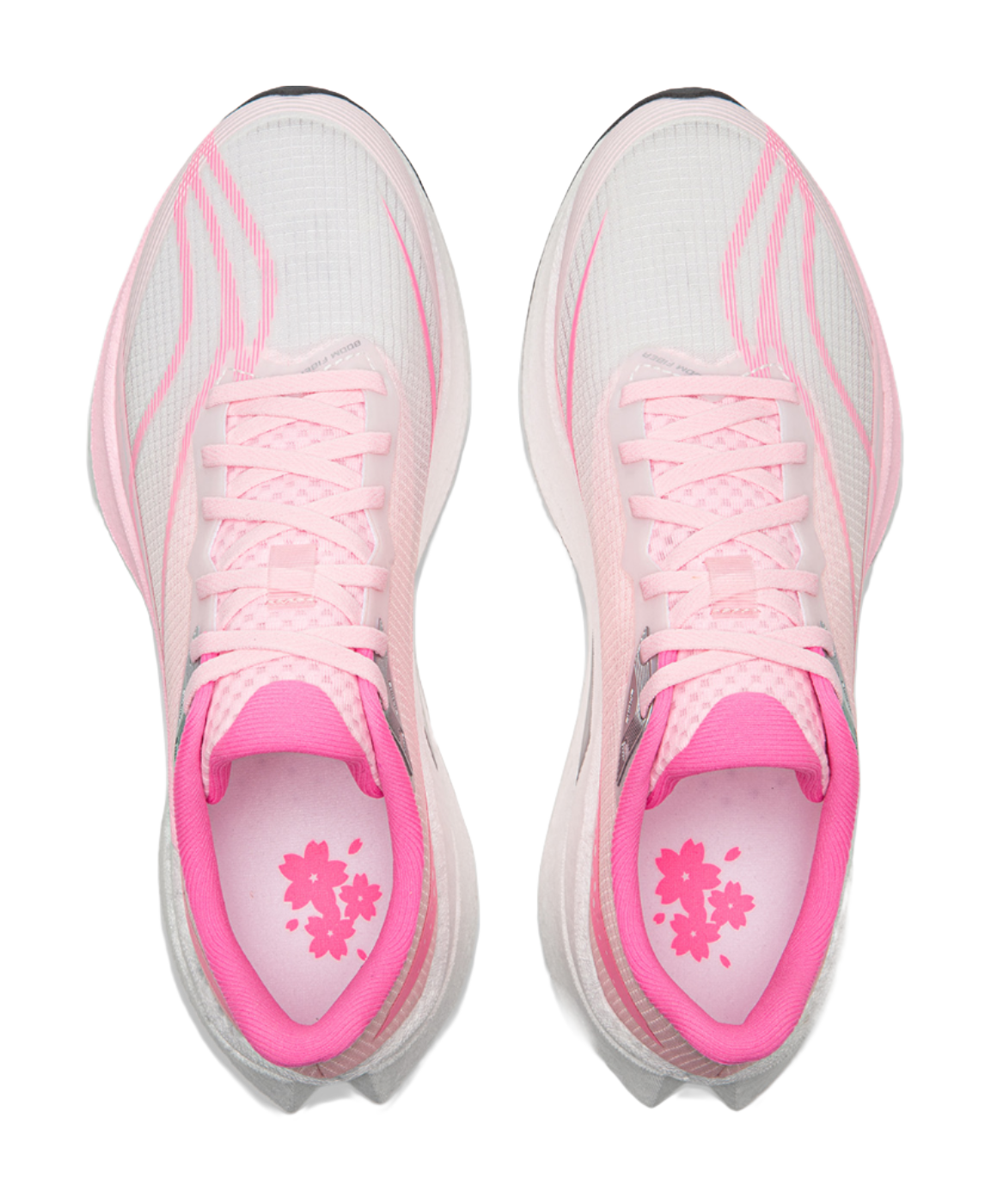 Pink running shoe interior with floral print insole and white lace-up upper