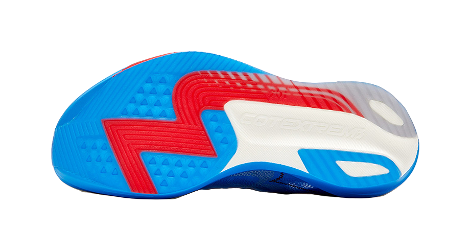 Sole of unisex low running shoe, blue tread with white logo and red sidewall
