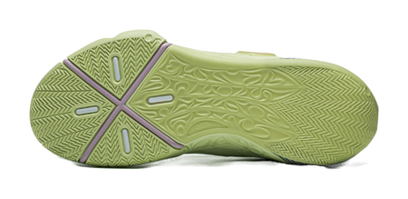 Green basketball shoe outsole view with herringbone traction pattern and purple heel tab