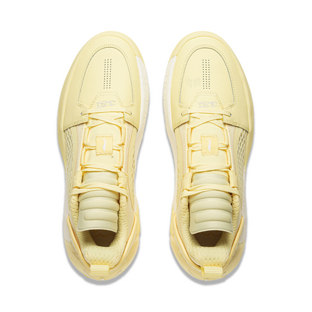 Pair of men's basketball shoes, light yellow lace-up design with cushioned collar