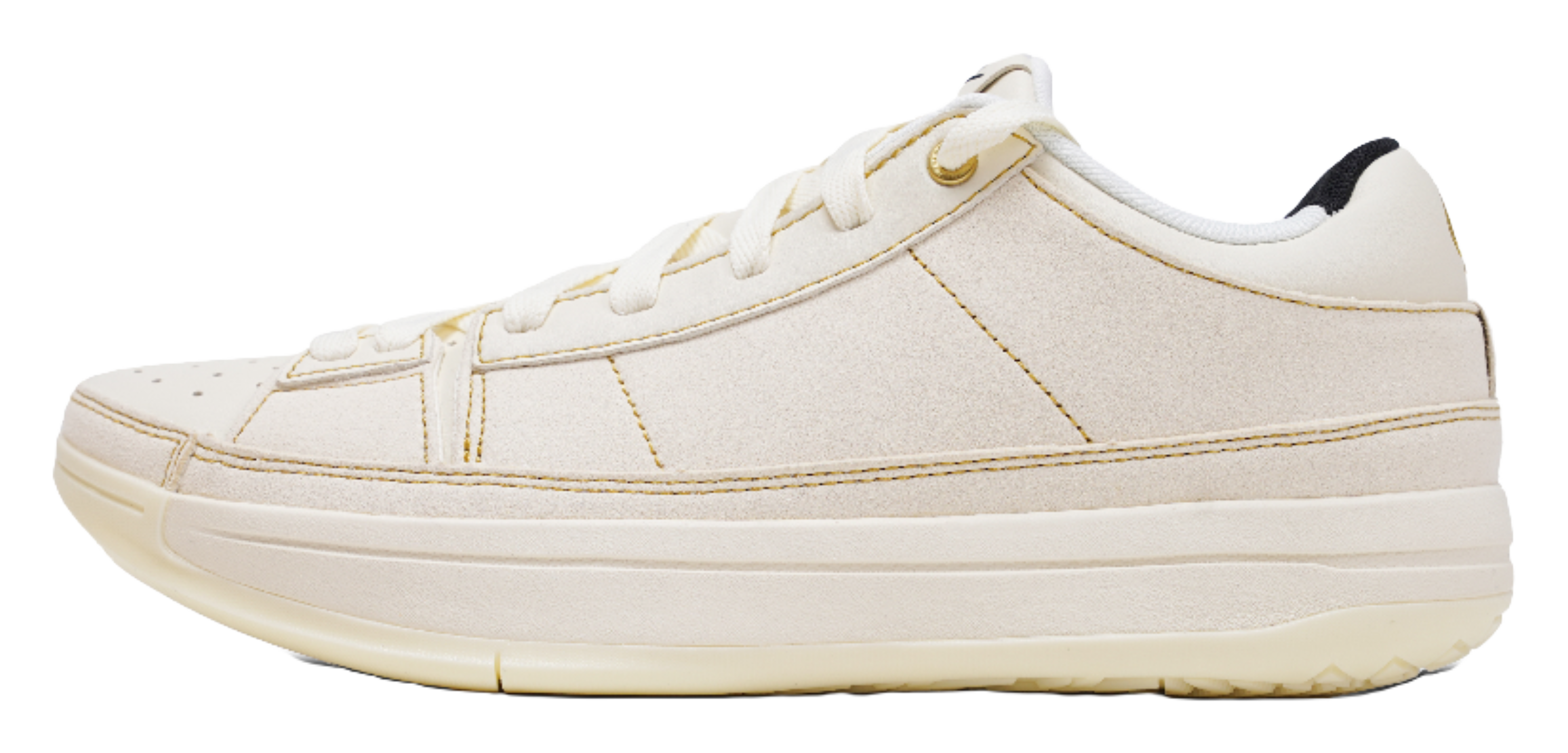 Cream low-top basketball shoes with lace-up front and gold stitching
