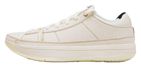 Cream low-top basketball shoes with lace-up front and gold stitching