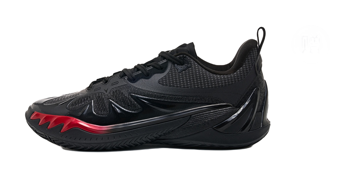 Unisex low-top basketball shoe, black knit-look upper with red detail near midfoot