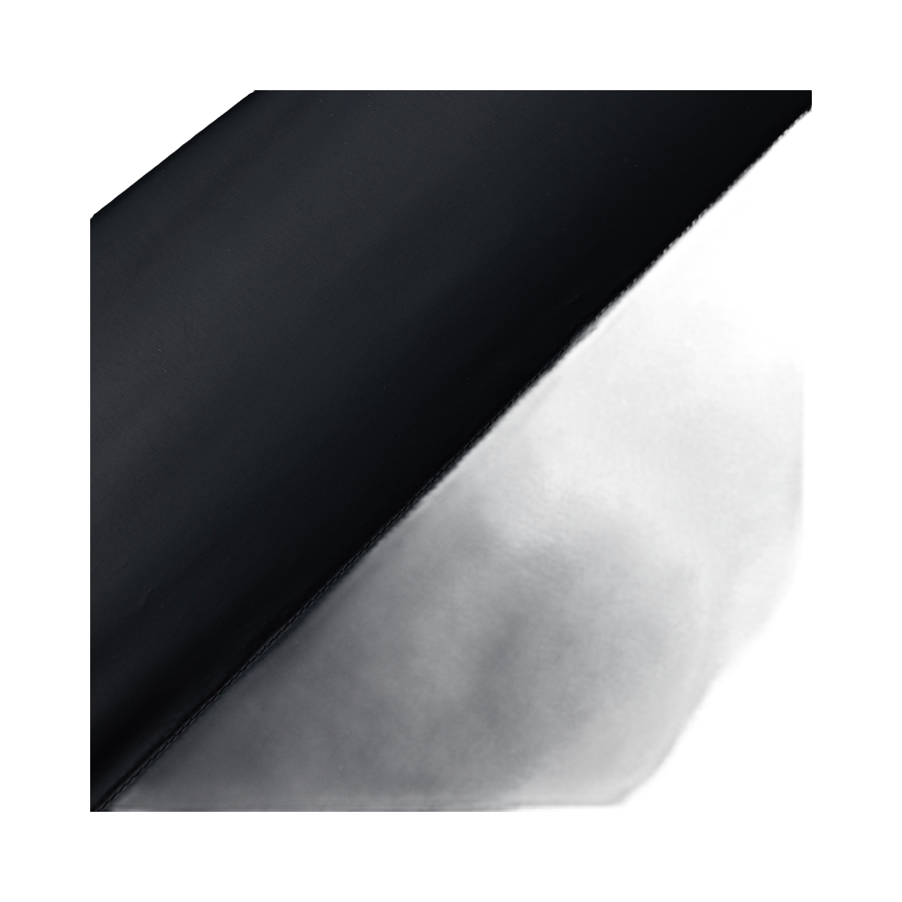 Black jacket fabric close-up with subtle texture and seam detail.