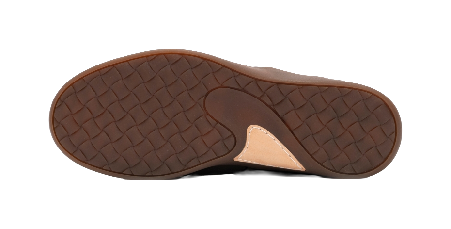 Brown rubber outsole with textured diamond tread and a small light-colored side insert.