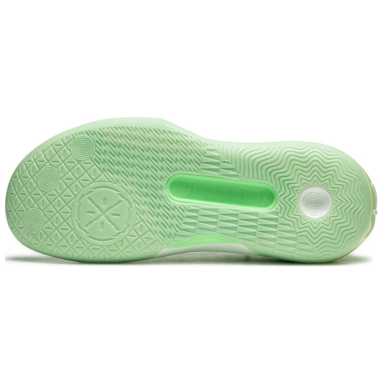 Agile green basketball shoe outsole, patterned traction tread and center cushioning panel.