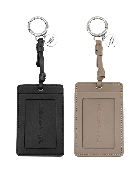 Leather key fob set with metal ring and stitched tag card, black and tan