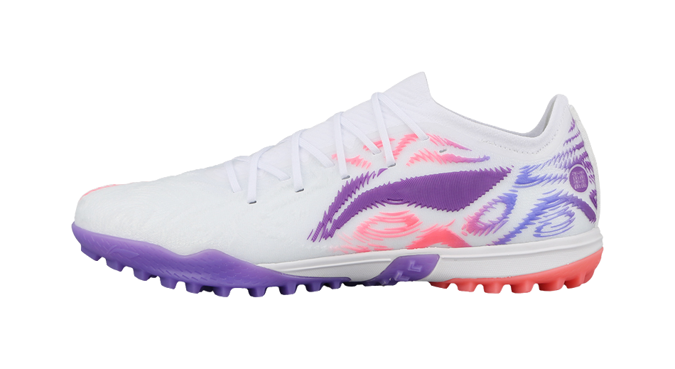 White soccer shoe with purple and pink graphic accents, lace-up turf sole