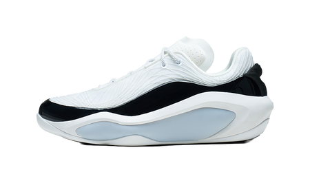 White and black basketball shoe with light-blue sole, side view