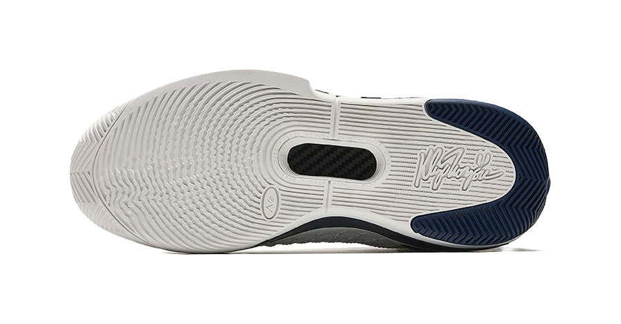 Unisex low basketball shoe outsole tread, white midsole with navy heel trim