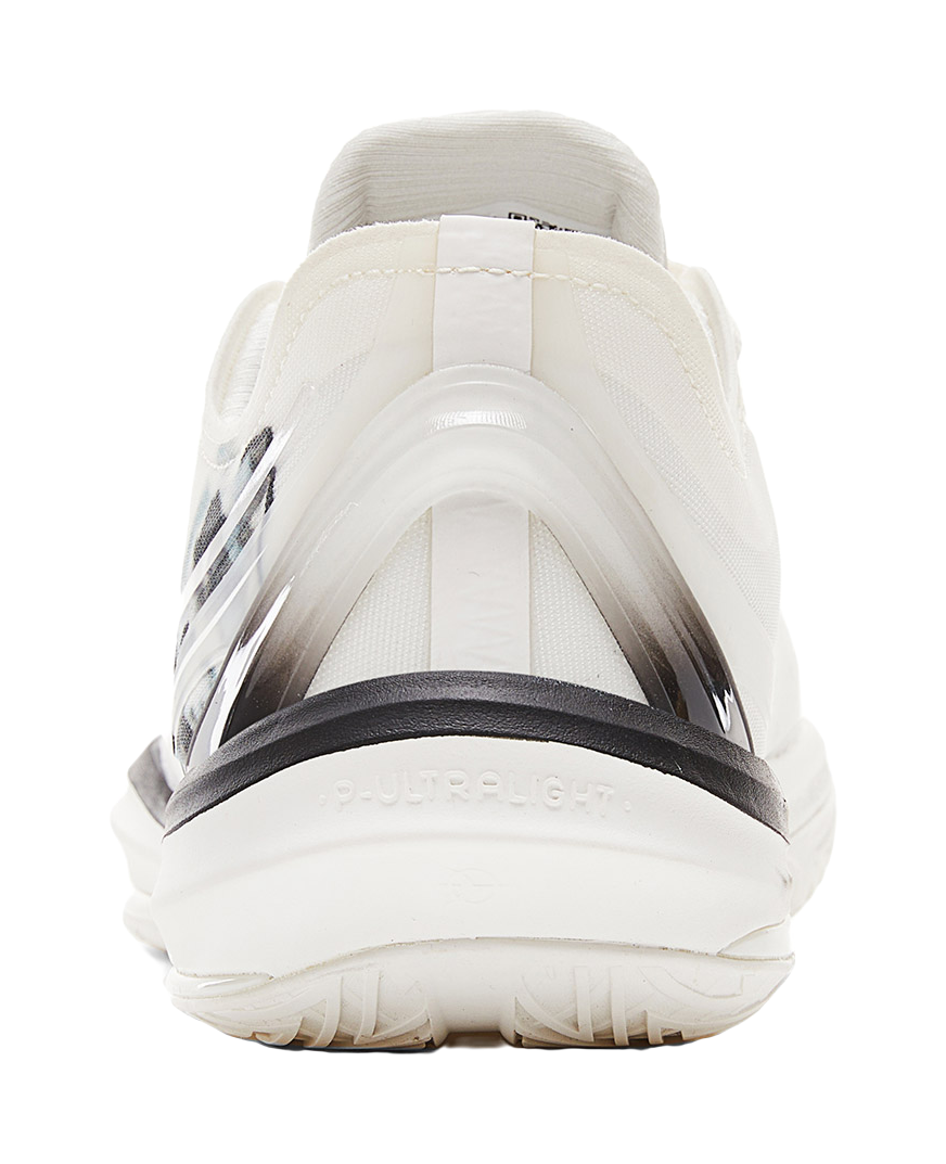 Lightweight basketball shoe heel, cream back with black accent band and cushioned collar