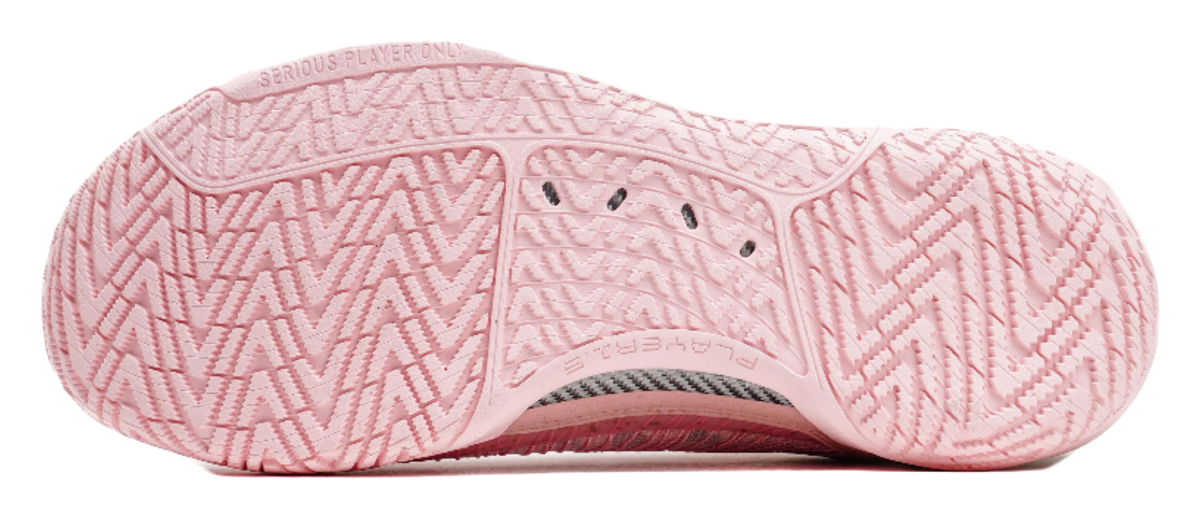 Pink basketball shoes showing patterned outsole tread and sidewall detailing