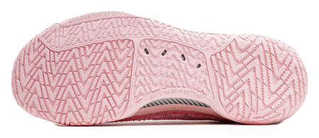 Pink basketball shoes showing patterned outsole tread and sidewall detailing