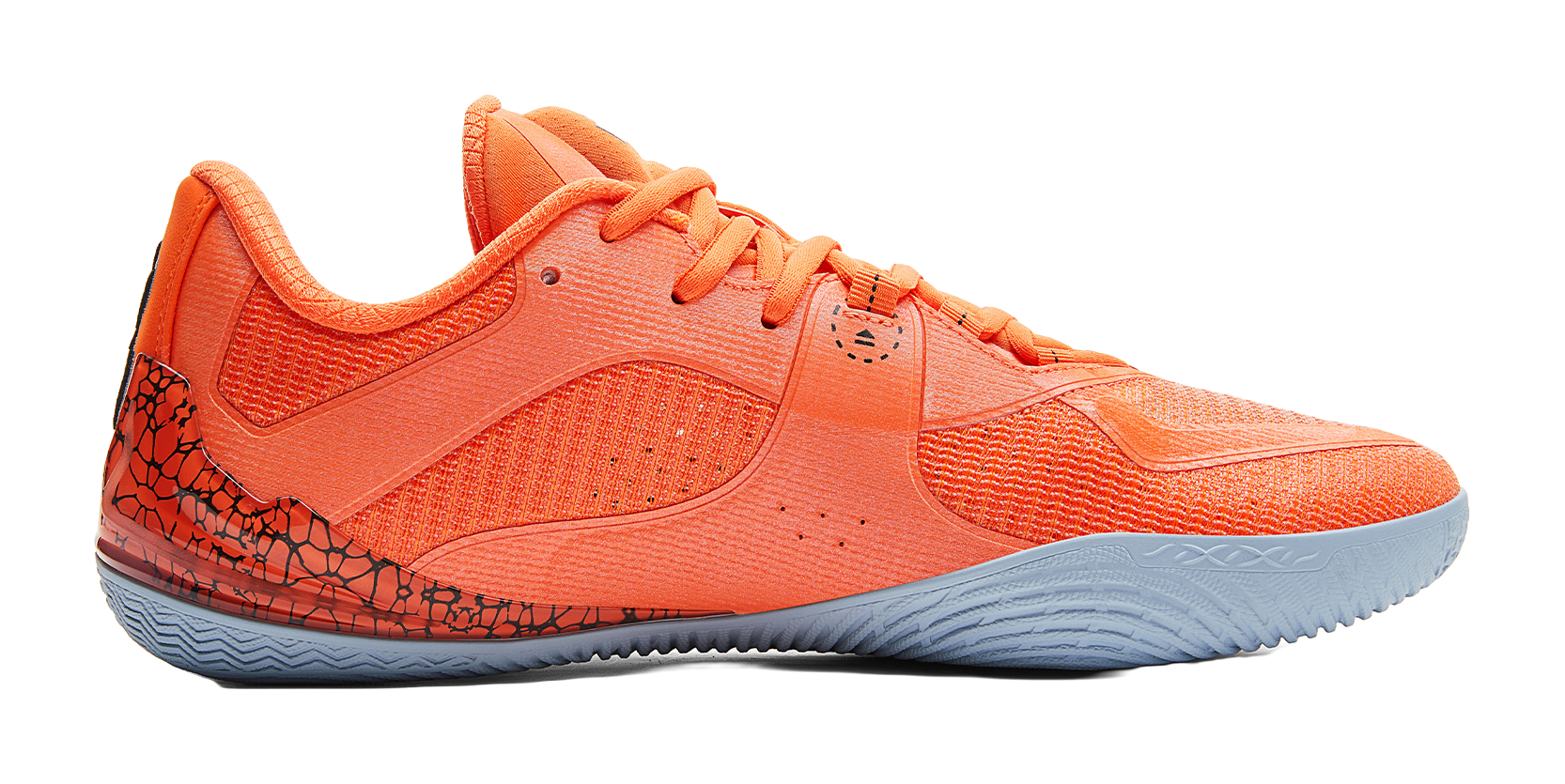 Orange basketball shoe, side view, textured upper and blue-gray rubber sole