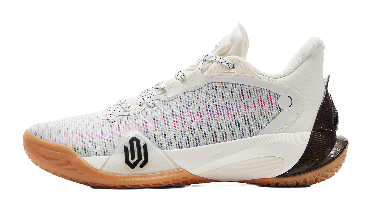 Ivory/white basketball shoe with multicolor knit upper and black heel panel
