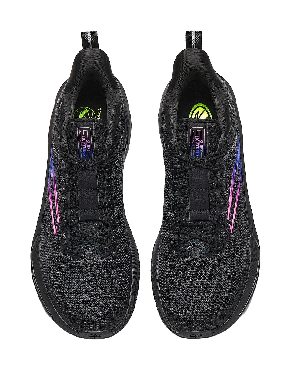 Black basketball shoes showing tongues and lace area, neon-green branding on heel tabs
