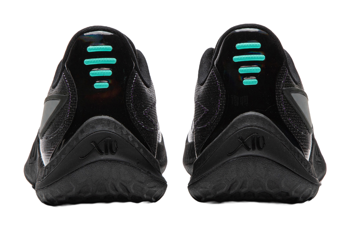Men's black basketball shoe heel view with X10 logo and teal tread accents