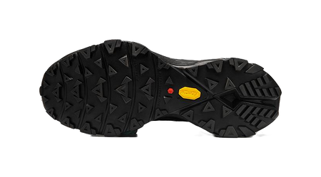 Black rubber outsole for trail running shoe with deep traction lugs