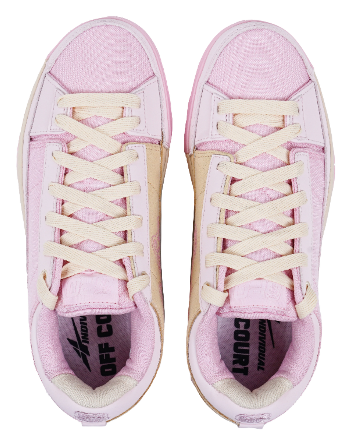 Pink canvas sneakers with cream laces and printed tongue lining