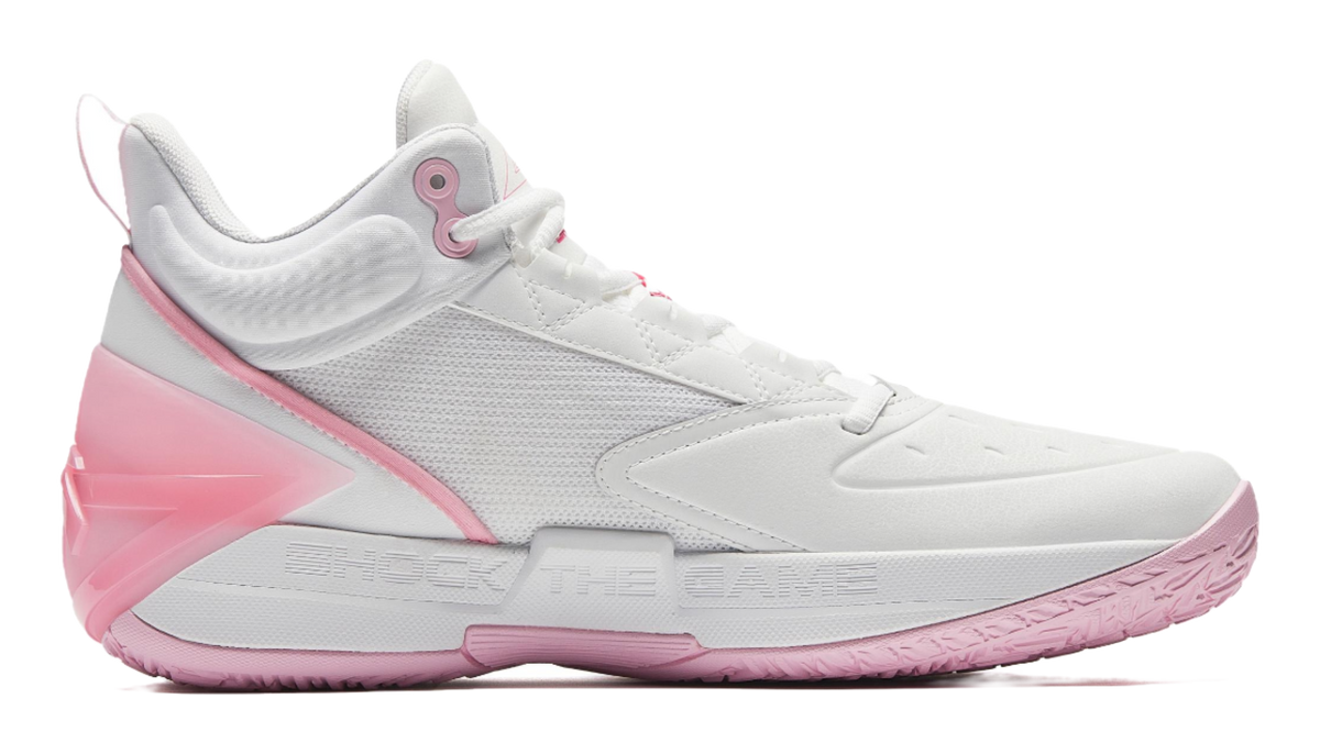 White and pink high-top basketball shoes, side view with pink panel accents