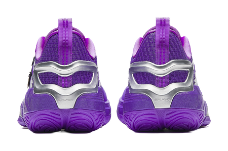 Purple basketball shoes with silver heel counter and textured rubber outsole tread.