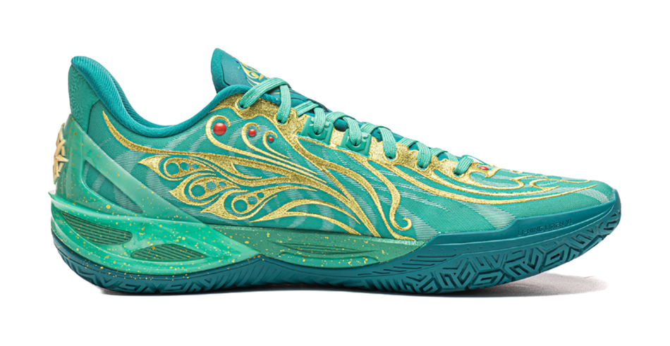Teal basketball shoe with gold flame-like pattern and turquoise lace-up upper