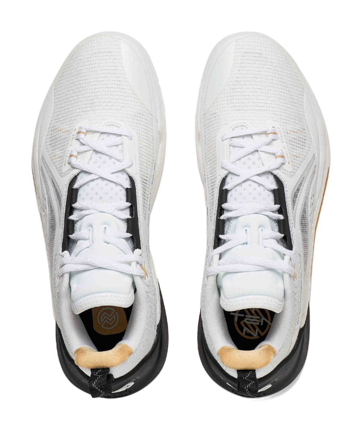 Pair of white basketball shoes with white laces and gray side panels