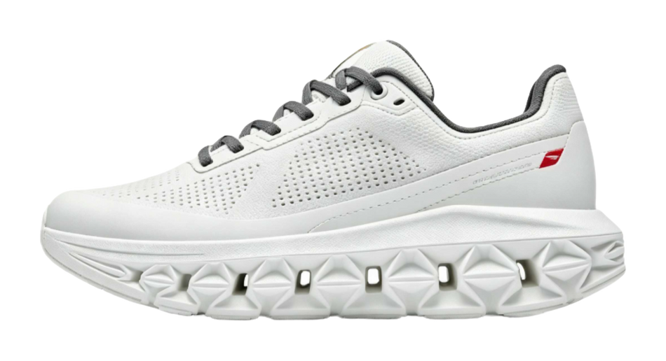 Women's low-top running shoe in white, lace-up with perforated upper and molded sole