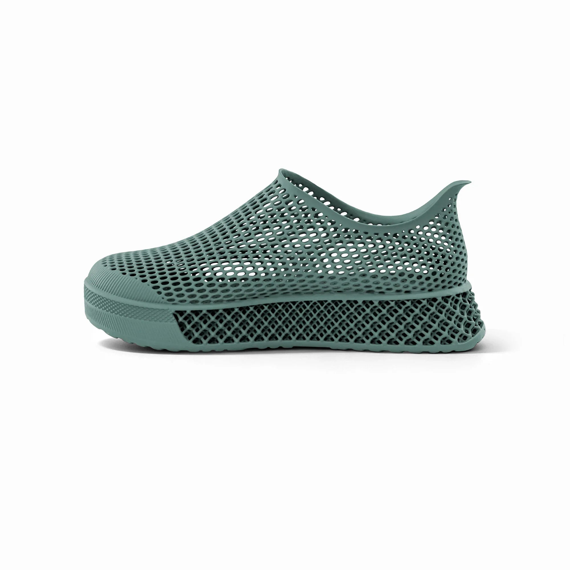 Green 3D-printed slip-on sneakers angled side view with perforated mesh upper