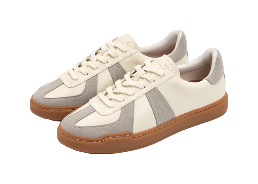 Pair of low-top skate shoes, off-white leather with gray side stripes and tan gum soles