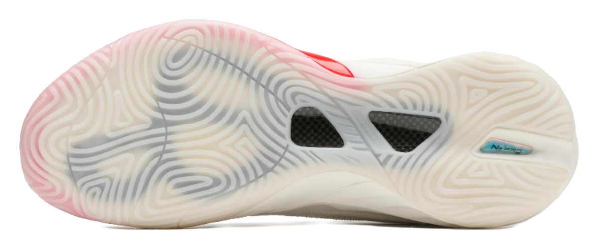 Unisex basketball shoe, outsole view with red heel and patterned midsole
