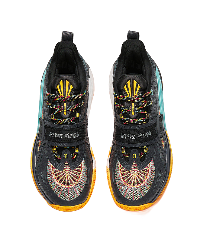 Pair of black basketball shoes with teal details and bright multicolor lace panels