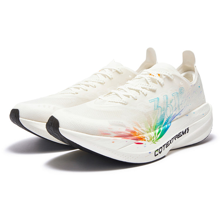 Pair of white running shoes, lace-up, blue side graphic with colorful splatter