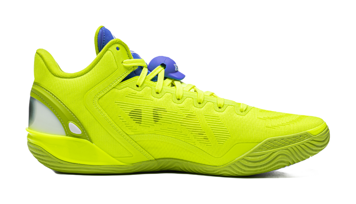 Green low basketball shoe, reverse side with textured panels and molded sole