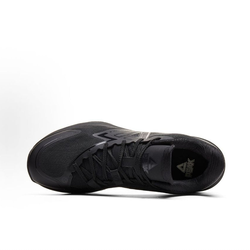 Black basketball shoe top view, laces and padded collar with brand mark