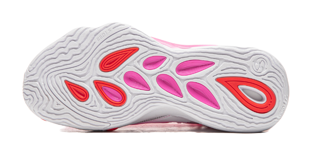 Unisex basketball shoe outsole, white tread with pink and red traction pods