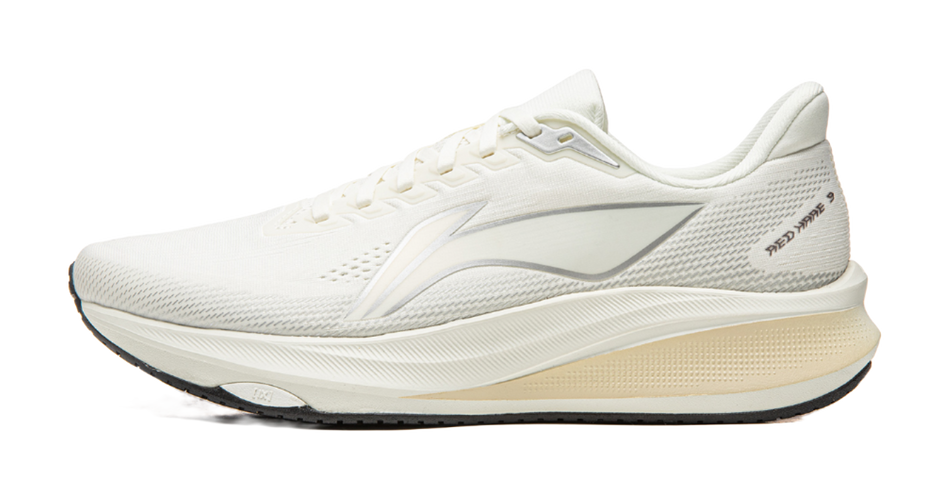 White lace-up running shoe with cushioned midsole and side logo detailing.