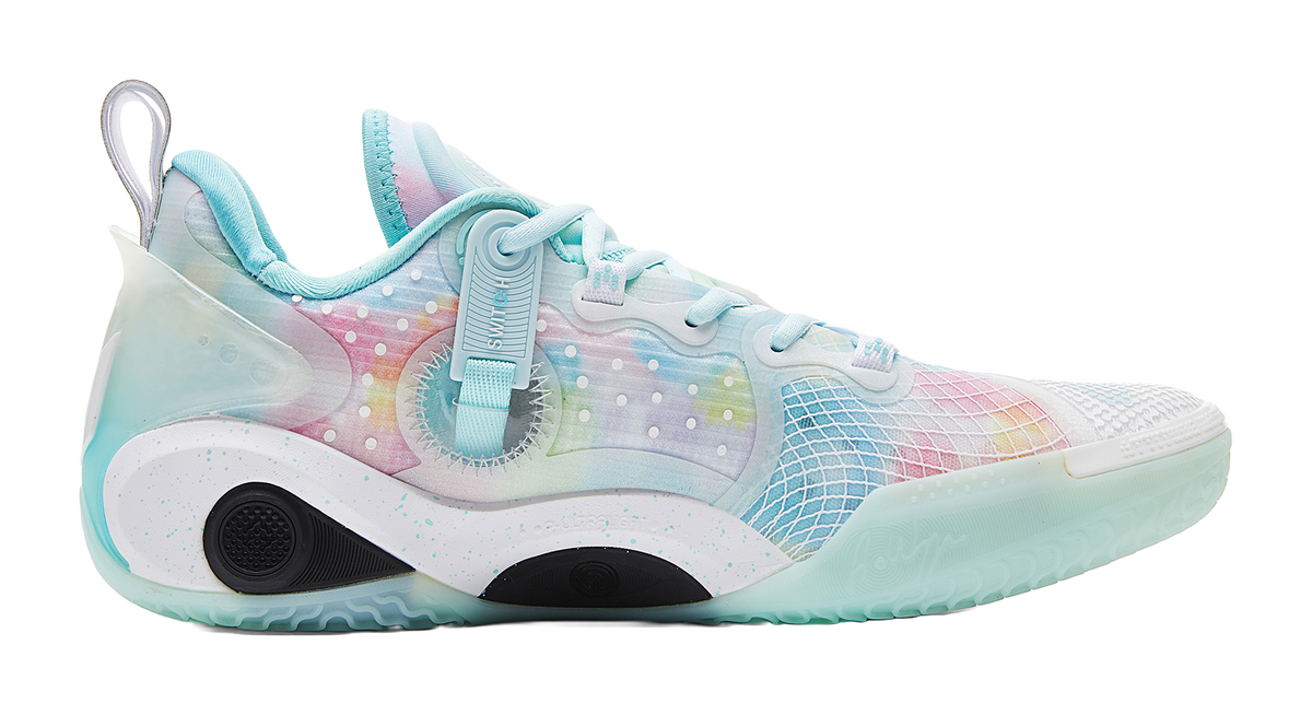 Light blue basketball shoe with multicolor side panel, white laces, and low sole
